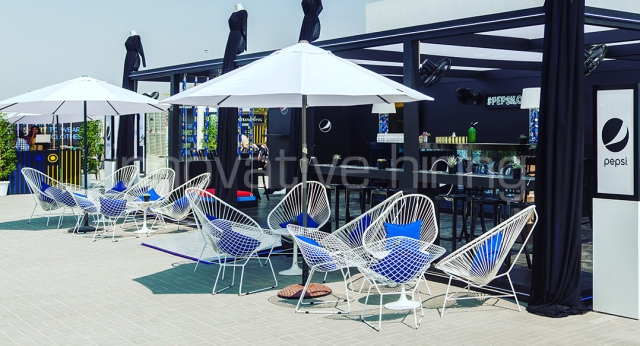 Features: Acapulco Chairs & Tulip Side Tables